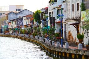 cafe on old picturesque waterfront, malaysia, malacca