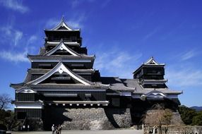 ancient fortified kumamoto castle at sky, japan