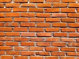 weathered red brick wall, background