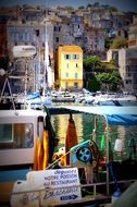 boats in port at old town in france in corsica