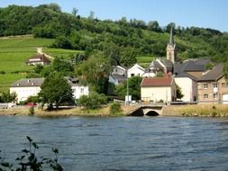 old village on hill at river, luxembourg, ahn