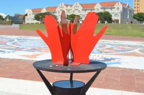 red metal palms, modern artwork in park, south africa, port elizabeth