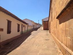 old one-storey buildings on street, spain, santander