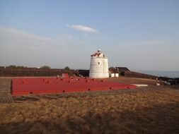 fort aguada lighthouse at evening, india, goa