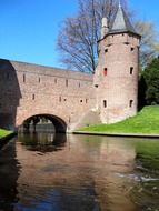 medieval tower with bridge at spring, netherlands, amersfoort