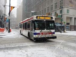 bus on street in snowfall, usa, pennsylvania, philadelphia