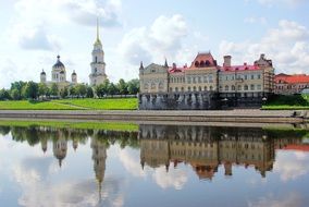 museum and cathedral on volga river side at summer, russia, rybinsk
