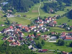 village in mountain valley at summer, slovenia, crni vrh