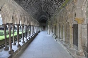 passage with vault in medirval mont saint michel abbey, france, brittany