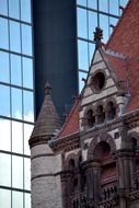 old building at modern glass facade, usa, massachusetts, boston