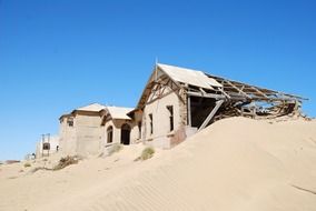 ruined buildings of ghost town in the Namib desert, namibia, Kolmanskop