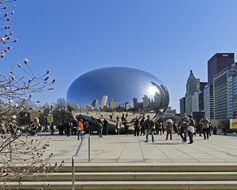 people on square with Cloud Gate sculpture at spring, usa, illinois, chicago