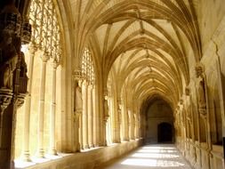 passage with star vault in gothic building, spain