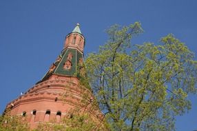 low angle view of kremlin tower at blue sky, russia, moscow