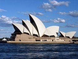 opera house on water at sky, australia, sydney