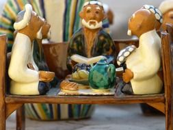 group of men in tea house, pottery, uzbekistan