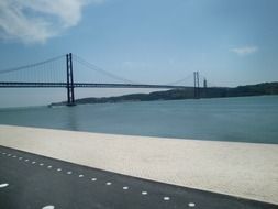 distant view of suspension bridge, portugal, lisbon