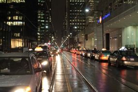 Cars on a road at night