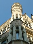 old corner building with tower, fragment of facade, latvia, riga