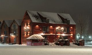 red building with lanterns at night