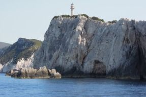 lighthouse on rocky island, greece, lefkada