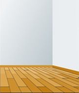 White walls and wooden floor in corner of empty room