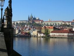 view of old city with beautiful buildings from Vltava river, czech, prague