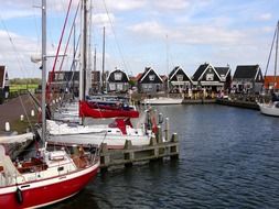 sailing boats at pier in village, portugal