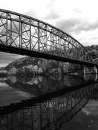 Black and white photo of the bridge and water