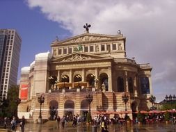 people at facade of opera house, germany, frankfurt