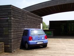 rear part of car built in wall of the construction