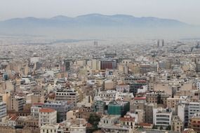 fog above city at mountains, greece, athens