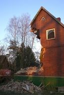 demolition of red brick house