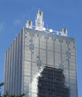 facade of modern buildings with grey rectangular pattern at sky, usa, texas, dallas