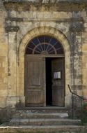 wooden entrance door to the church
