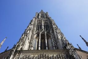 Old cathedral tower front sky scene