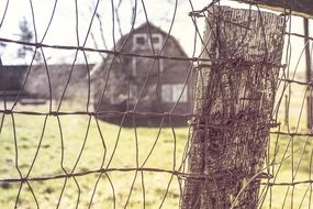 wire mesh near the farmhouse