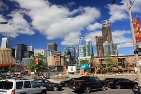 cars parked at construction site in city, canada, ontario, toronto