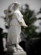 marble angel, vintage statue on cemetery