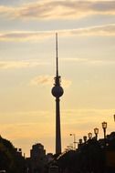 tv tower silhouette at sunset sky in city, germany, berlin