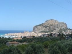 old town on coast at rock, italy, sicily, cefalÃ¹