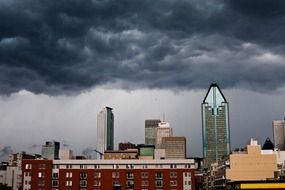 scenic stormy clouds above city, canada, montreal