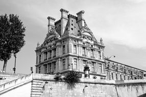 louvre museum building, view from seine river, fragment, france, paris