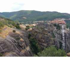 orthodox varlaam monastery on rock in mountain landscape, greece, meteora