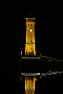 lindau port lighthouse by night, allgau, bavaria