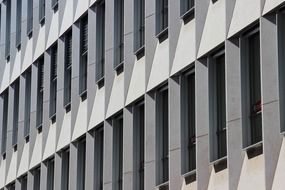 grey facade of modern building, perspective