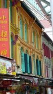 pastel painted facades of traditional chinese buildings, singapore