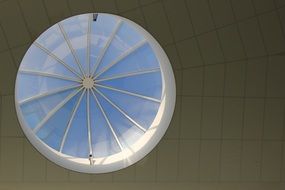 round window in dark surface