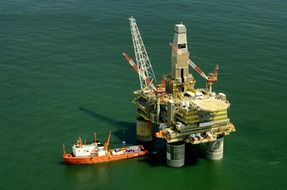 ship on sea at oil platform, russia