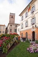 flower bed on plaza at town hall, italy, liguria